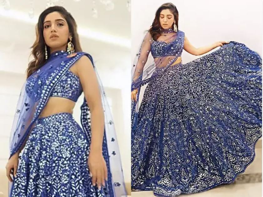 When it came to Bhumi, she picked an intricate mirror-work lehenga in royal blue colour. She styled the lehenga with a heavily embellished blouse and a sheer dupatta. Keeping her make-up minimal, she completed her look with a pair of ethnic earrings. 