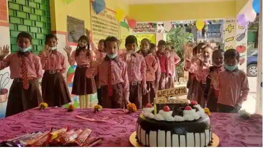 Primary school welcomes students with Chocolates, flowers and balloons in uttar Pradesh as school reopen today.