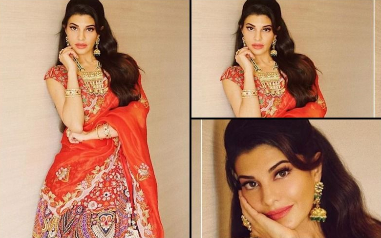 Trend of the day: Jacqueline wore a red and orange lehenga choli with heavy jewelry.